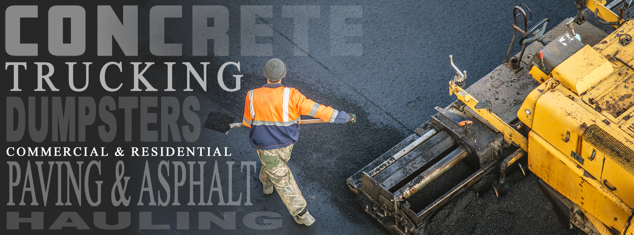 Workers lay a new asphalt coating using hot bitumen. Work of heavy machinery and paver. Top view